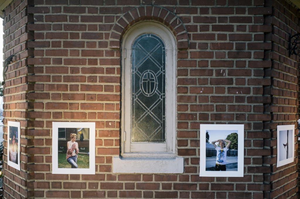 Zophia Dadlez prints installed on church for pop-up exhibtion in Brooklyn